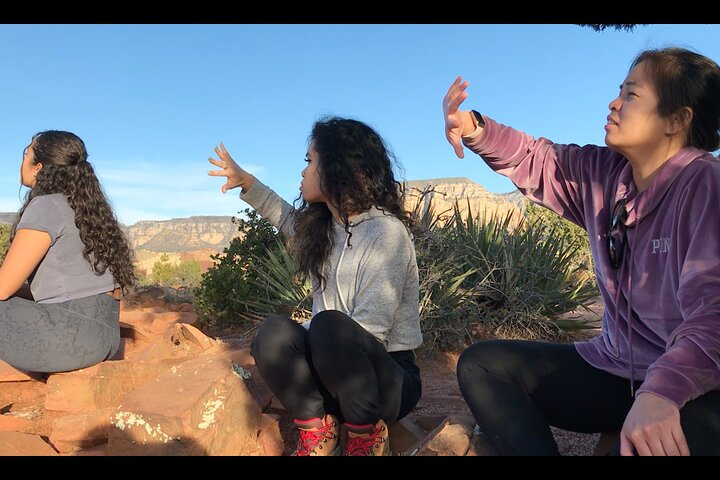 Prana Viewing Vortex Experience guests learning how to see the Prana and make it interact with their hands. 